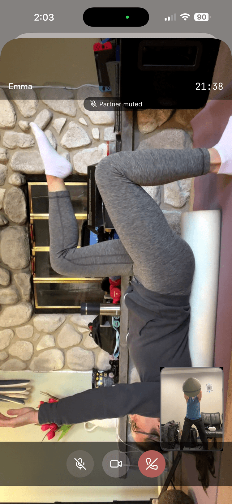 Two people exercising together on a live MoveWith video call